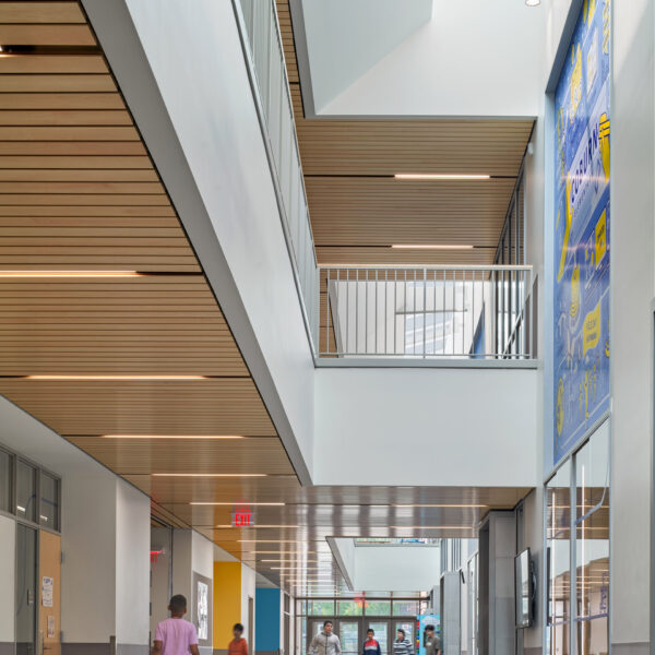 Students walking in elementary school hallway