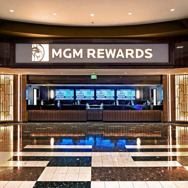 MGM Rewards loyalty desk with illuminated counters and modern Art Deco interior at luxury resort lobby entrance